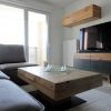Rectangular coffee table with adjustable table top in solid oak